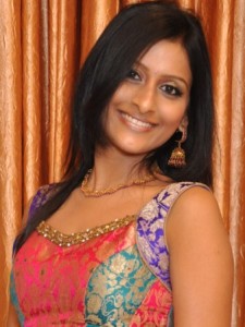 Headshot of a girl in Indian attire smiling
