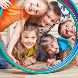 Closeup shot of children looking from circular rings